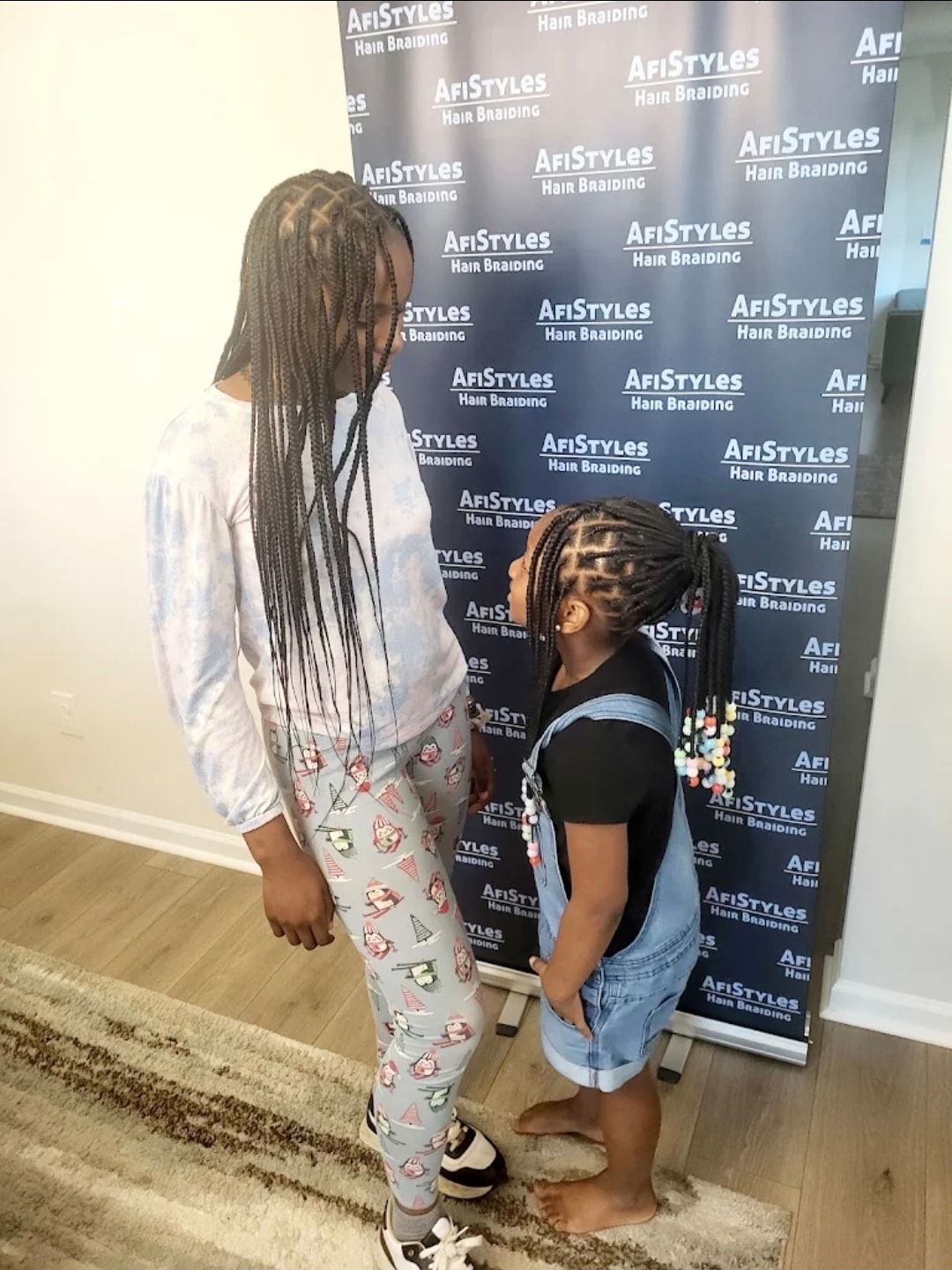 Young girl with cornrows and beads